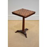 A Victorian rosewood and bird's eye maple games table with chessboard top, stamped 'Bostook' to