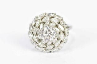 A platinum diamond dress ring, with central brilliant cut diamond, approx 1.5ct, flanked by thirty-