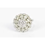 A platinum diamond dress ring, with central brilliant cut diamond, approx 1.5ct, flanked by thirty-