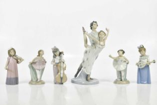 NAO; a collection of six figures including a dancing couple, two ballerinas, a girl playing a