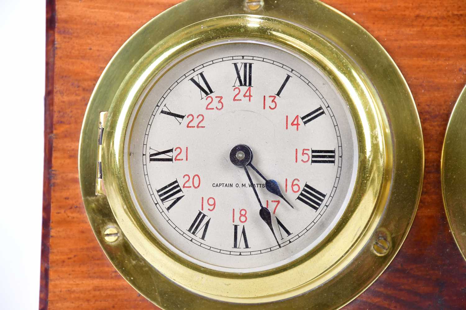 CAPTAIN O M WATTS; a brass cased ship's clock set with Roman and Arabic numerals, with thermometer - Image 2 of 4