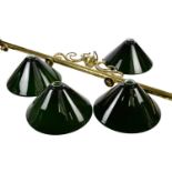 Four vintage green and white glass light shades, diameter 34.5cm, with a brass four light snooker