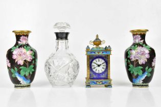 A modern Chinese brass carriage clock, with urn finial, height 18cm, a pair of cloisonné vases and a