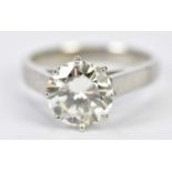 A platinum diamond solitaire ring, the eight claw set round brilliant cut stone weighing approx. 3.