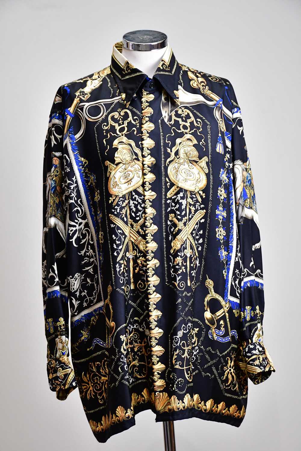 HERMÈS; a 100% silk 'Ludovicus Magnus' shirt, designed by F. De La Perriere, in mainly black, gold