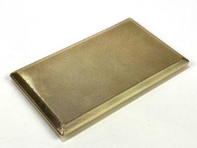 A 9ct yellow gold cigarette case of rectangular form with engine turned decoration, approx 219.6g.