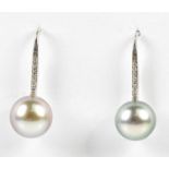 A pair of 18ct white gold and Tahitian pearl drop earrings, length approx. 25mm.