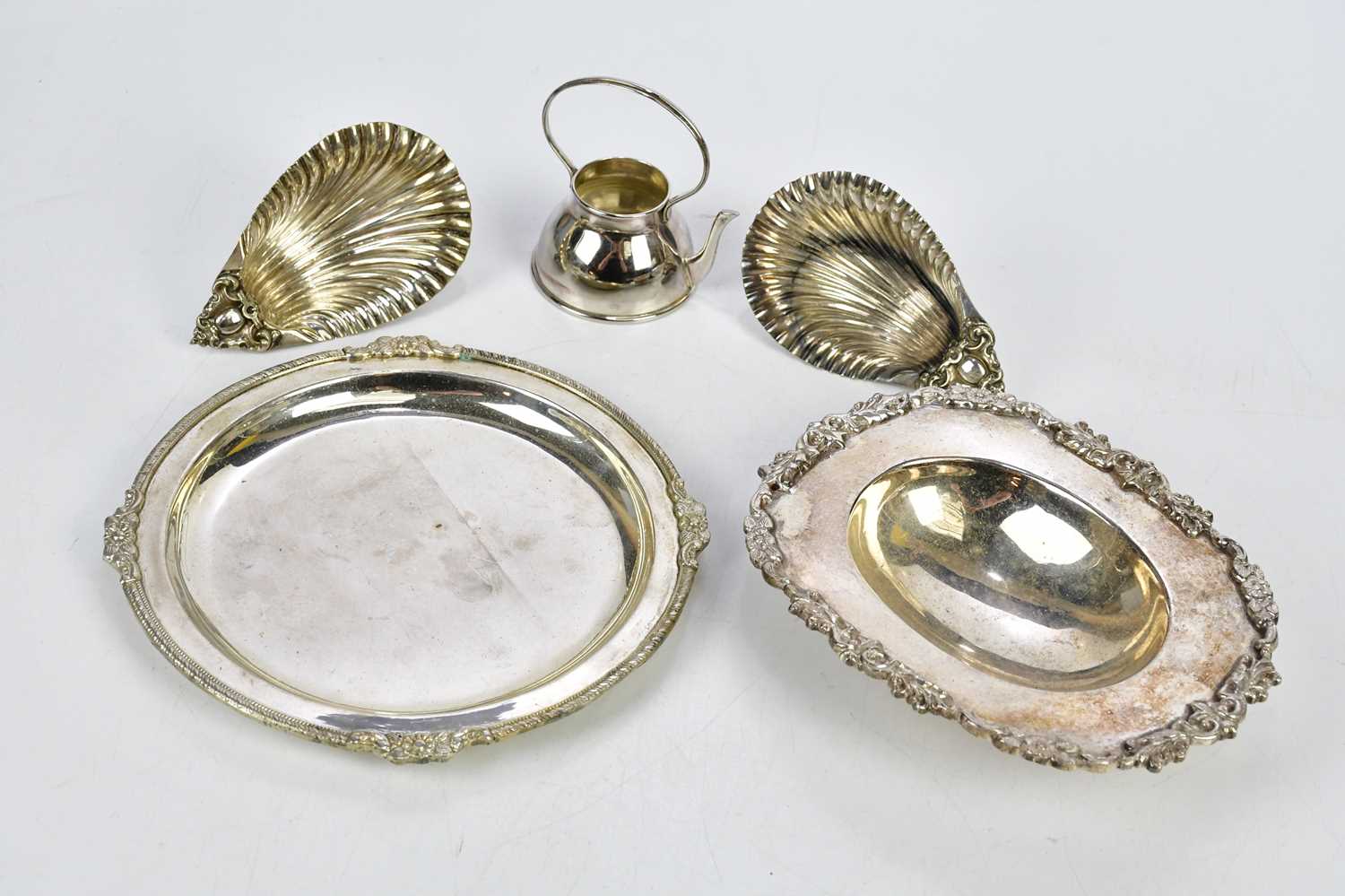 A small selection of white metal items, to include an oval dish with cast detailing, length 16cm.