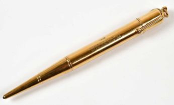 BAKERS POINTER PENCIL; a 9ct gold cased propelling pencil, length 12cm, total weight approx 28.4g.