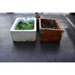 Two garden troughs converted from sinks, the white example 62cm long, and a drain cap (3)