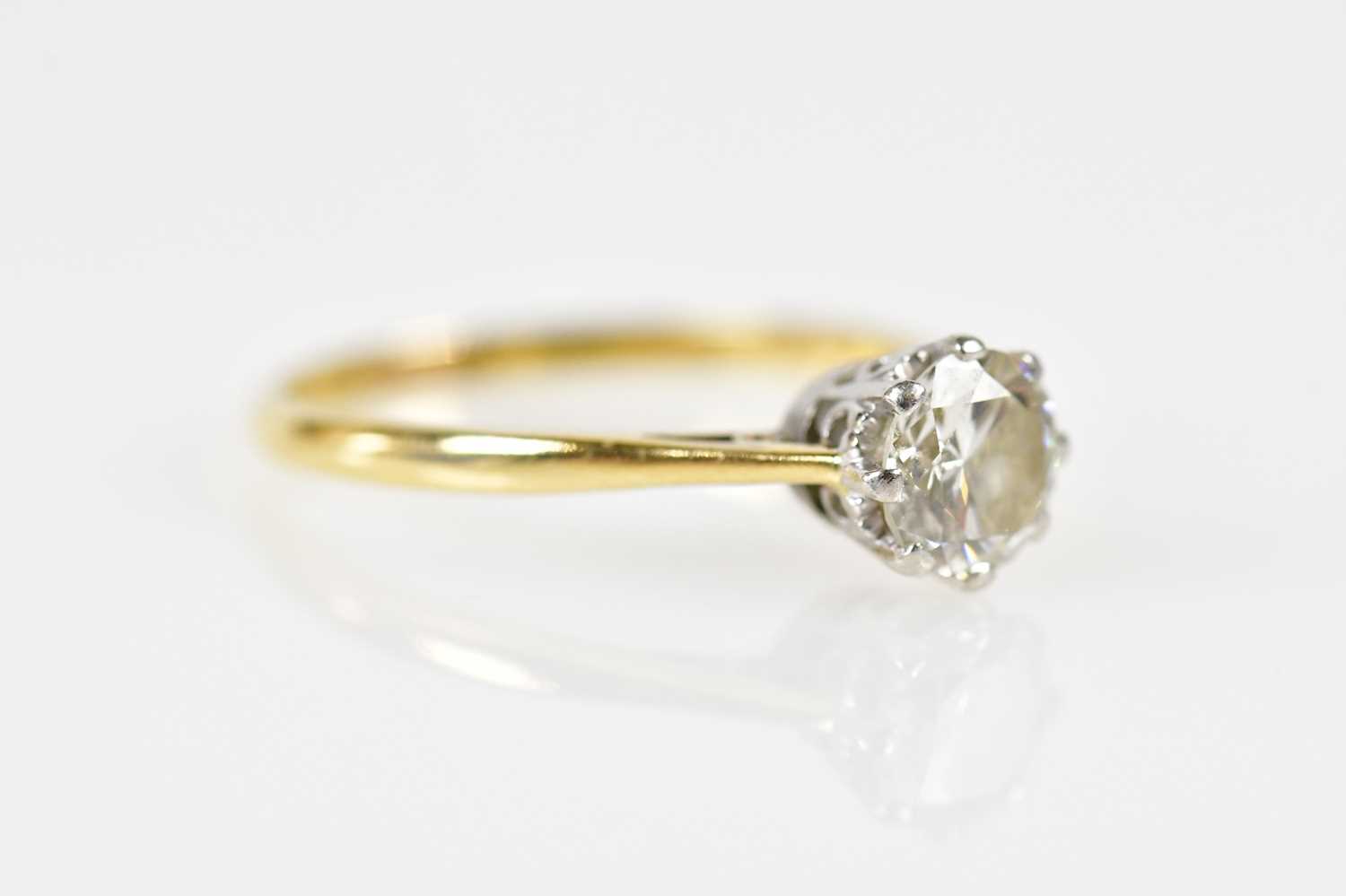 An 18ct yellow gold platinum tipped diamond solitaire ring, the round brilliant cut eight claw set - Image 6 of 7