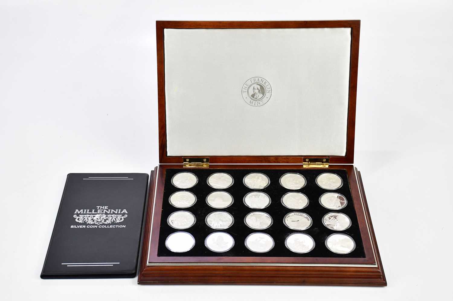 THE FRANKLIN MINT; a cased set of twenty silver coins to celebrate the advent of a new millenium