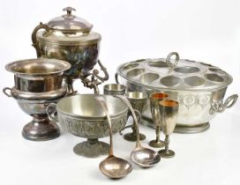 A collection of plated items, including punch bowl, two ladles, two goblets, ice bucket, tea urn,