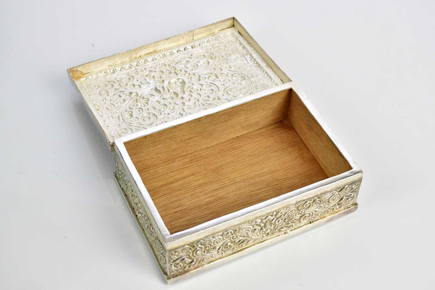 A Indian plate mounted wood cigarette box, with allover scrolling detailing,. length 15.5cm. - Image 2 of 3