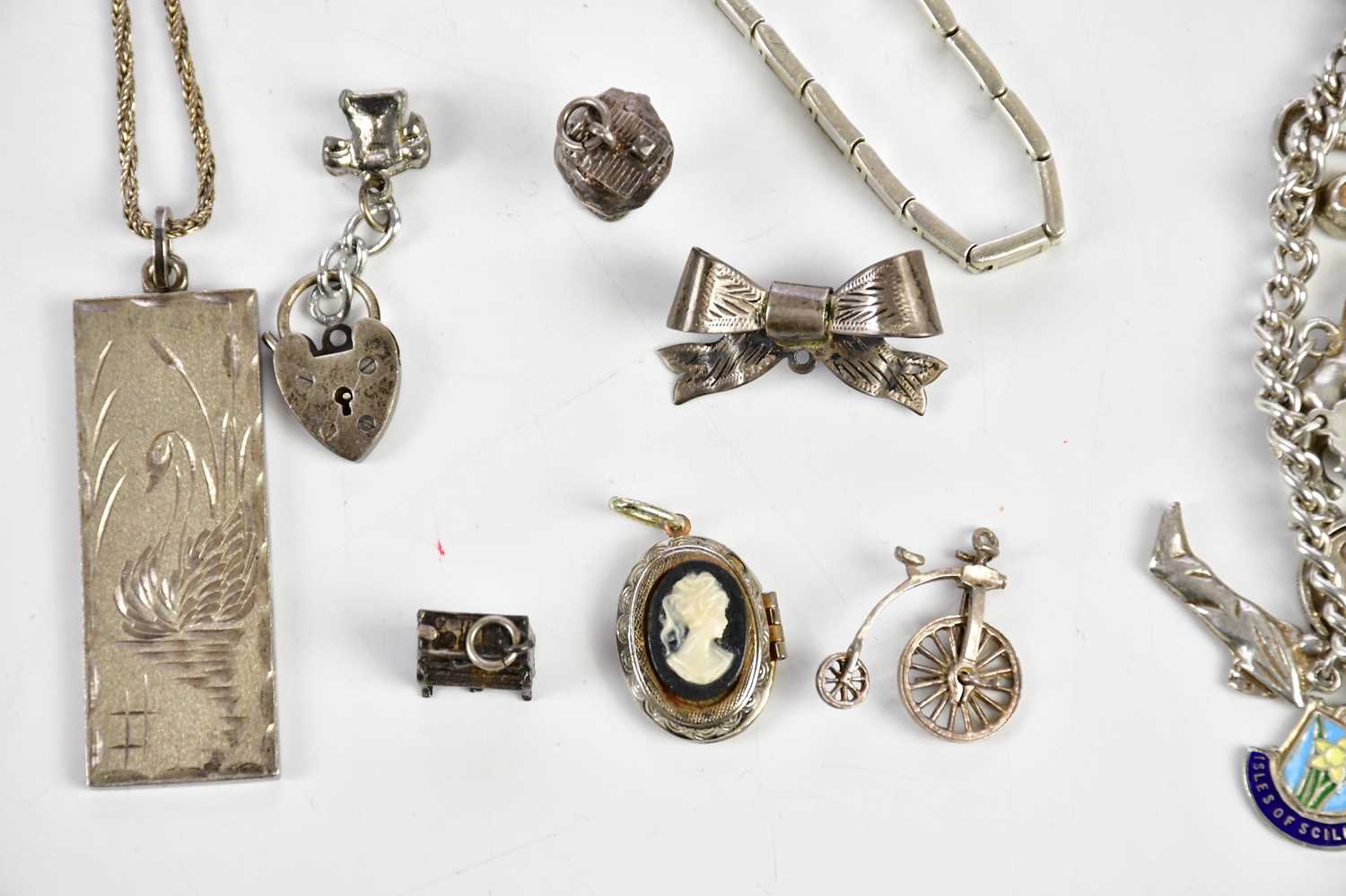 A group of silver and white metal jewellery including a charm bracelet, ingot on chain etc, combined - Image 2 of 3