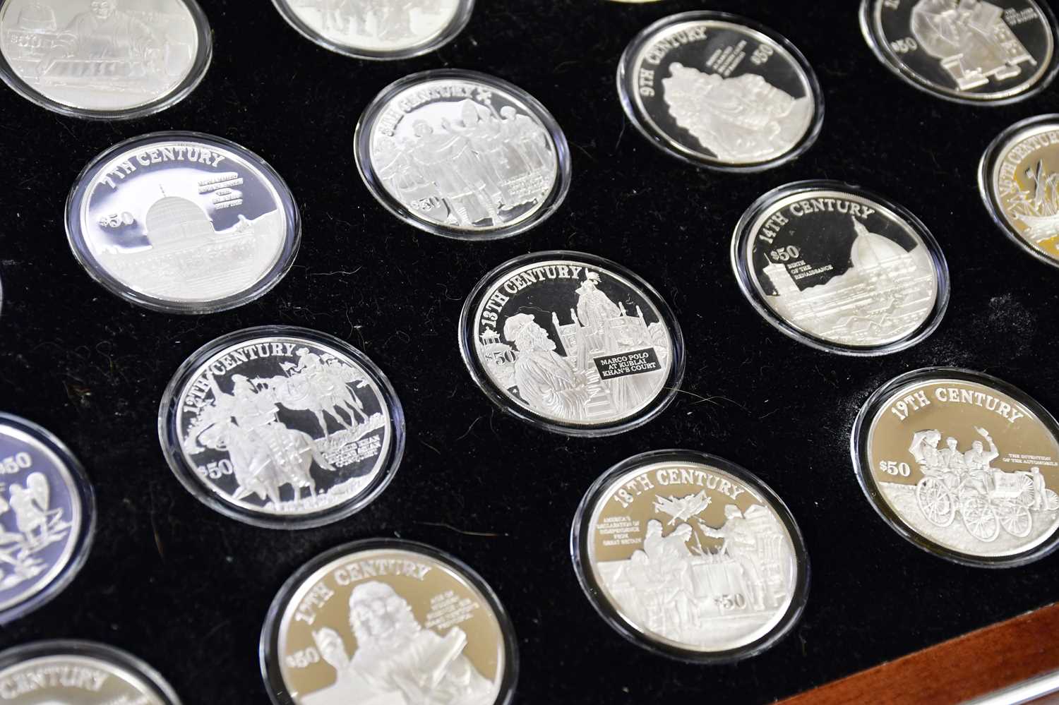 THE FRANKLIN MINT; a cased set of twenty silver coins to celebrate the advent of a new millenium - Image 3 of 3