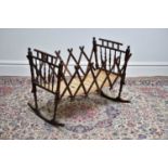 A late 19th century campaign folding crib.