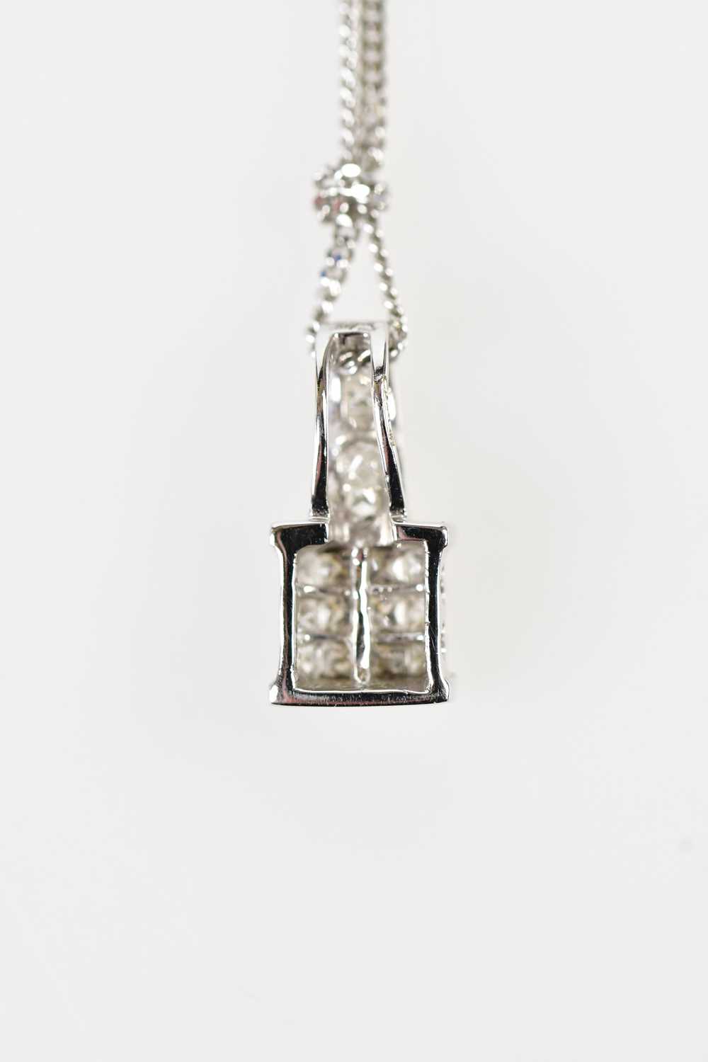 An 18ct white gold and diamond set pendant with four diamonds to the bail and twelve diamonds to the - Image 3 of 3