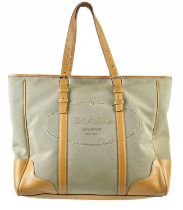 PRADA; a large brown canvas Canapa handbag with maker's logo to front, trimmed with tan brown