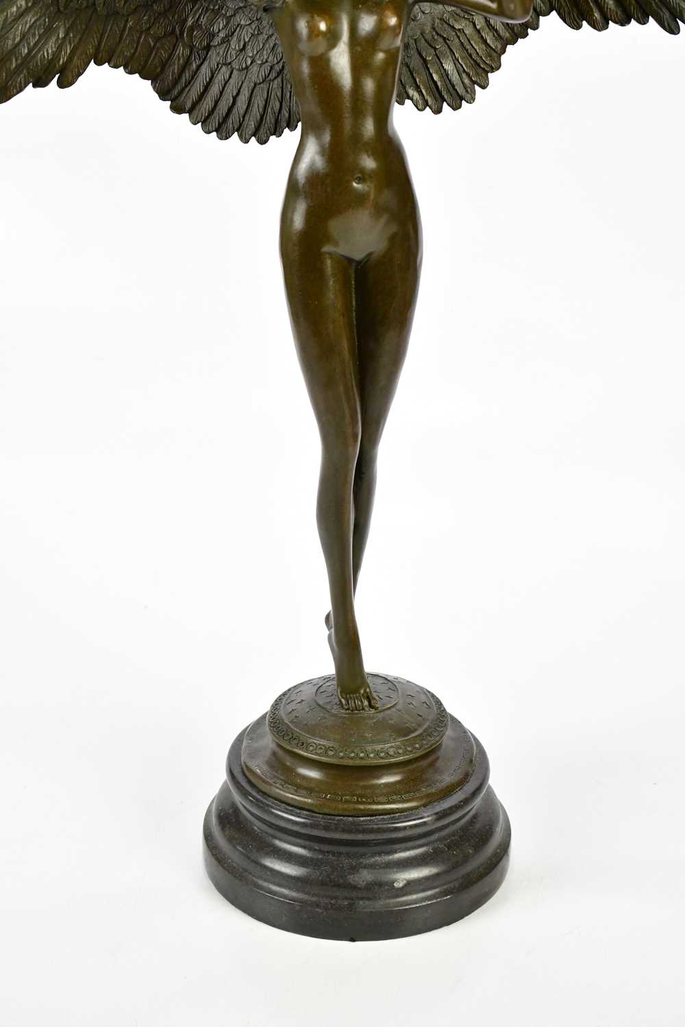 A reproduction bronze figure representing a winged nude maiden, height 53cm. - Image 3 of 6
