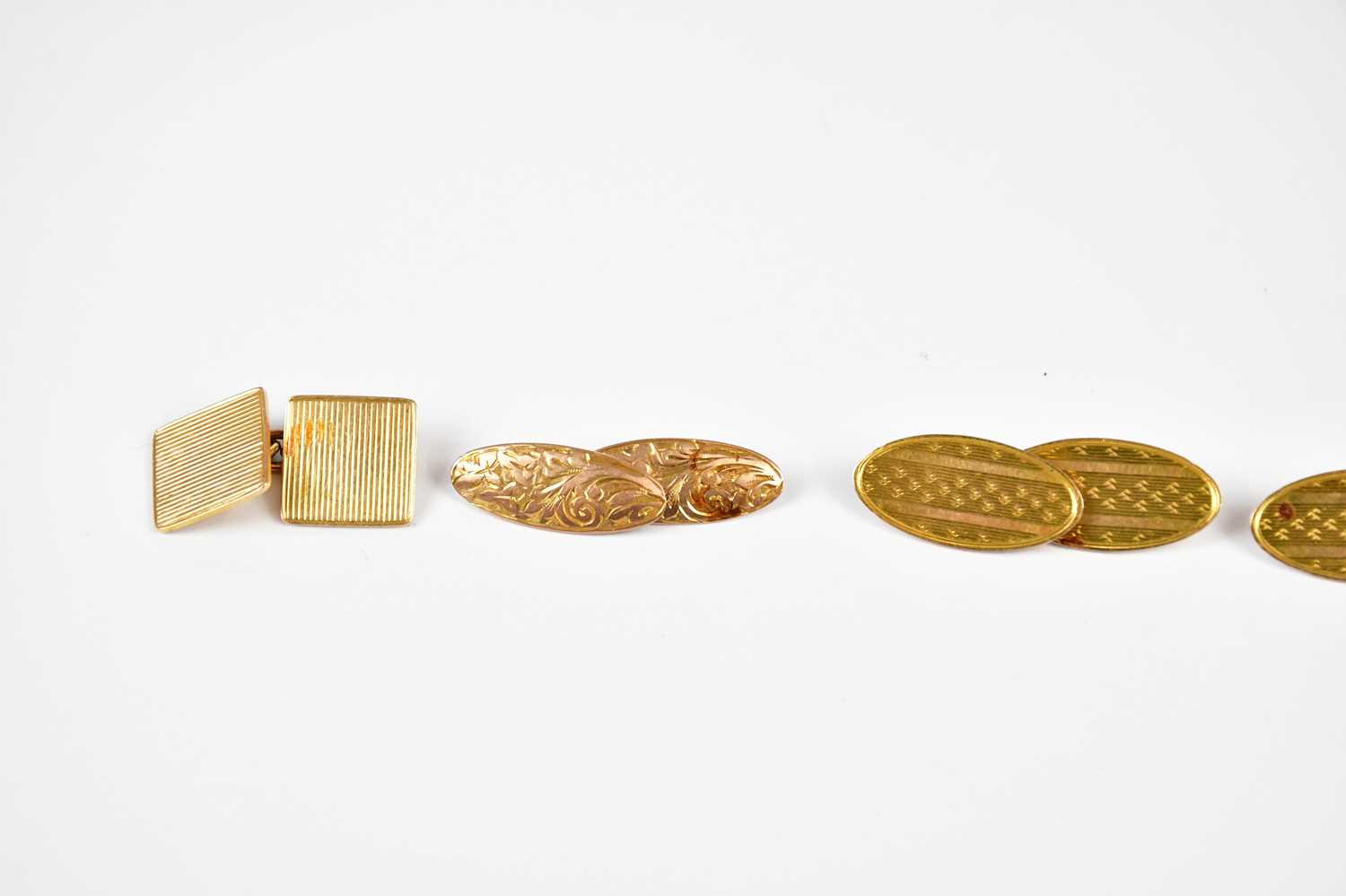 A pair of 15ct yellow gold cufflinks (8.46g), and two pairs of 9ct yellow gold cufflinks (11.48g) - Image 2 of 3