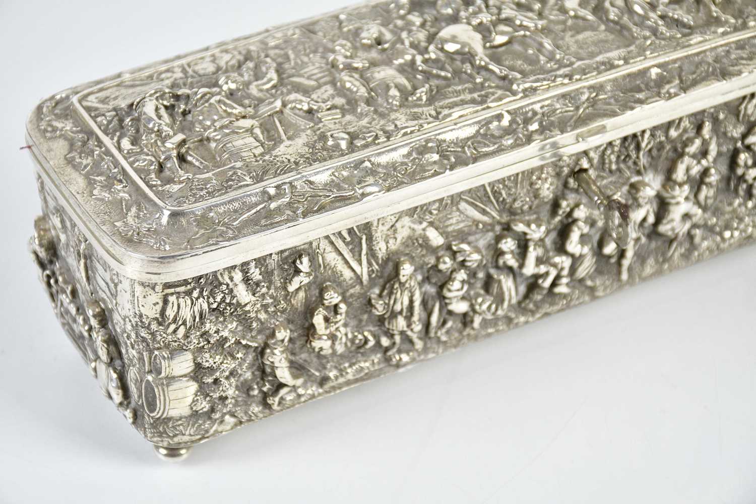 A Continental white metal casket of rectangular form embossed with tavern scenes and figures on - Bild 5 aus 6