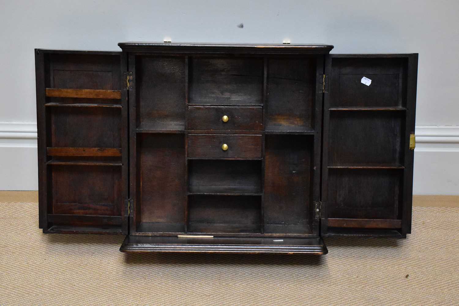 ROGER DODGSON, ULVESTON; An oak hanging cupboard, the two doors enclosing two drawers and shelves, - Image 2 of 5