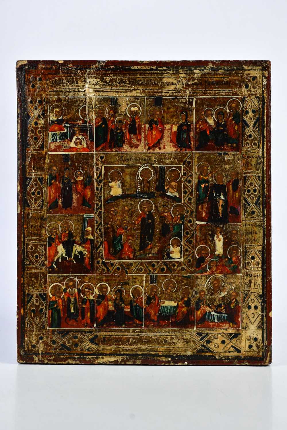 An 18th century Russian icon with twelve scenes of the resurrection, 31 x 26cm.