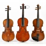 Three German half size violins comprising a Straduari Conservatory Violin with two-piece back length