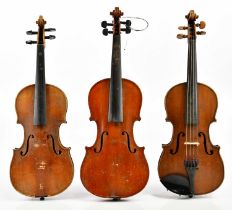 Three German half size violins comprising a Straduari Conservatory Violin with two-piece back length