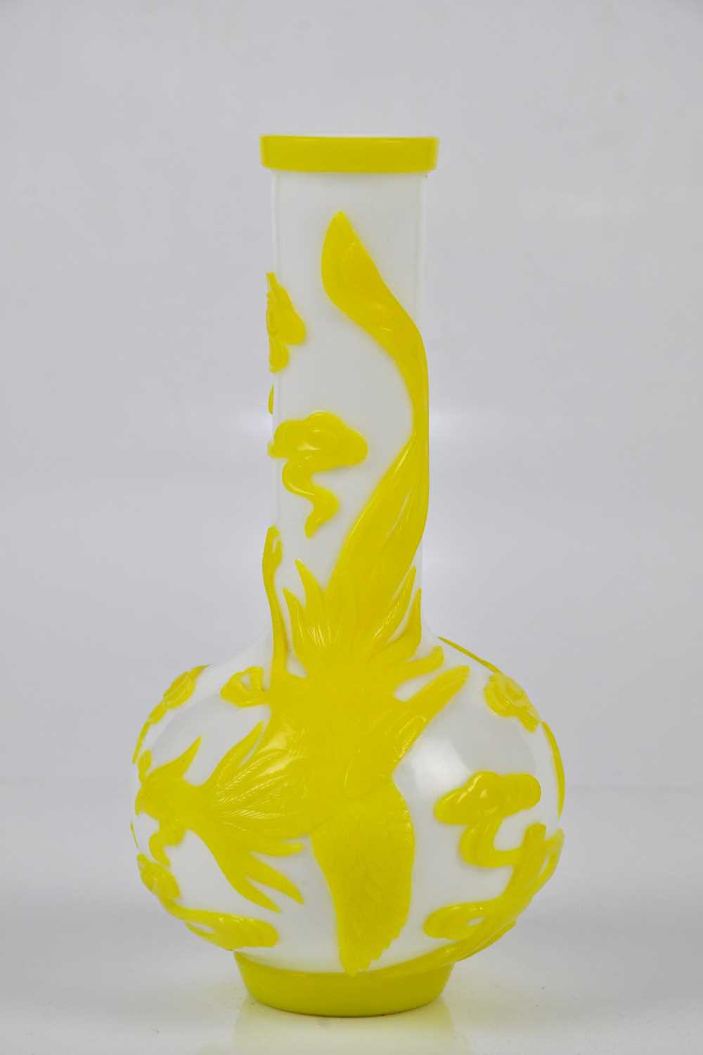 A 20th century Chinese glass bottle vase, decorated with phoenix, height 22cm. Condition Report: