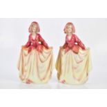 KATZHUTTE; two Art Deco ceramic figures depicting a maiden wearing a bonnet with flowing dress,