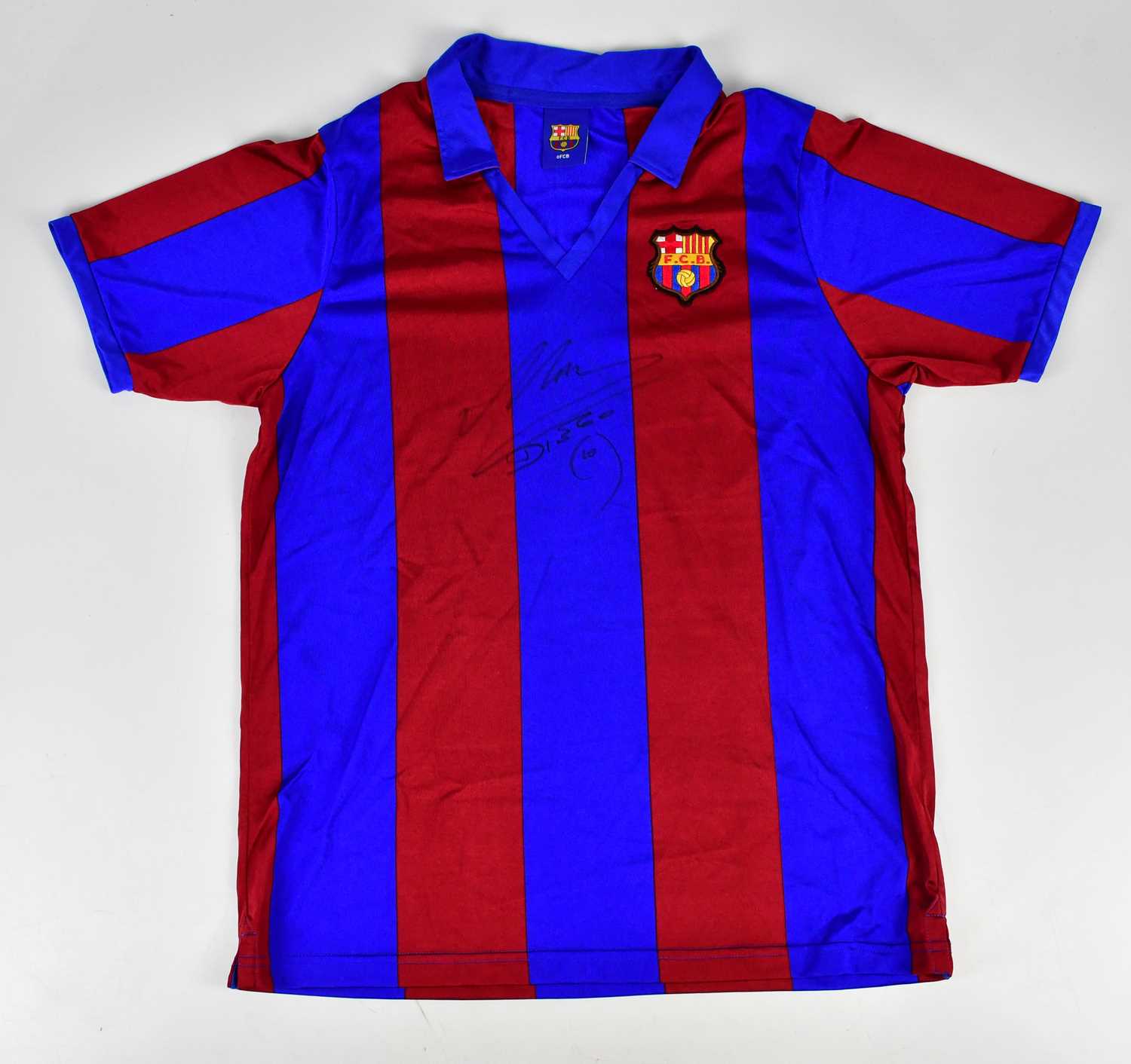 DIEGO MARADONA; a signed Barcelona retro style football shirt, signed to the front, size XL.