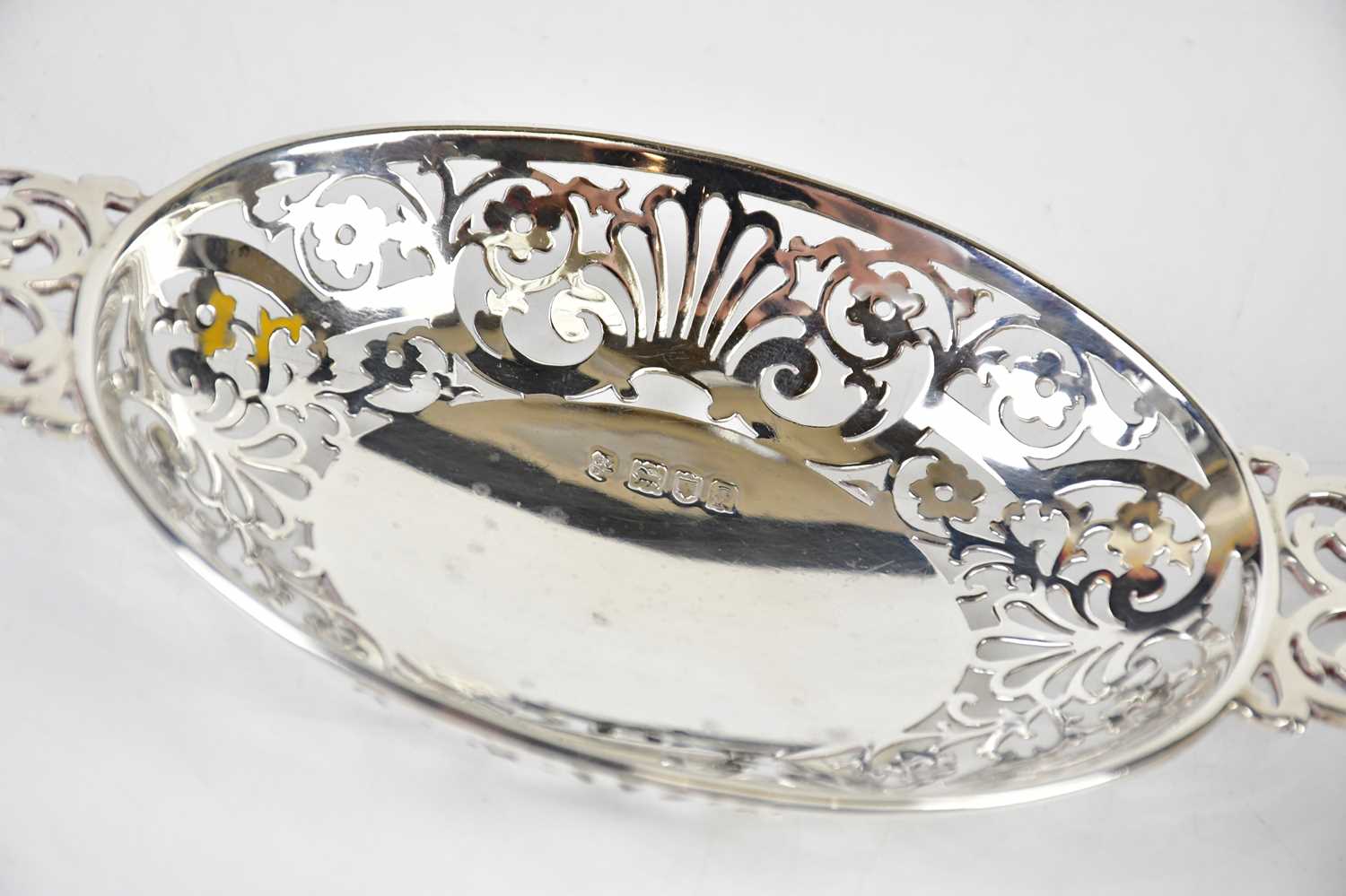 JOSIAH WILLIAMS & CO; an Edward VII hallmarked silver twin handled bonbon basket with cast open - Image 2 of 3