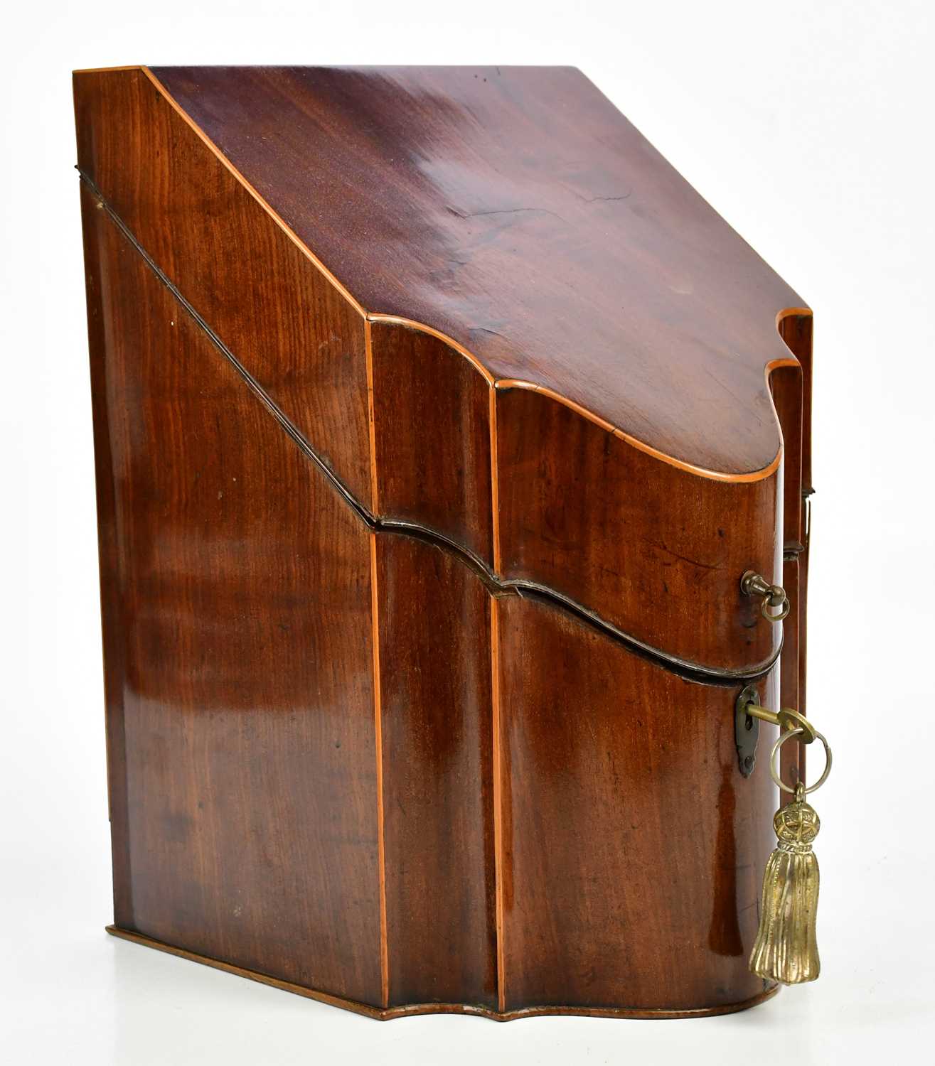 A Victorian inlaid mahogany knife box, the hinged cover enclosing fitted interior, height 34cm,
