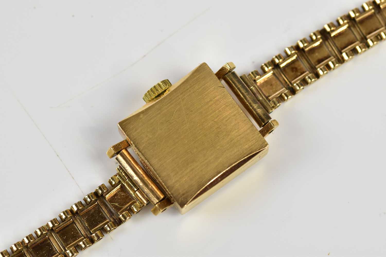 TUDOR; a lady's 9ct gold cased wristwatch, the dial set with batons, suspended on a 9ct gold - Image 3 of 4