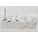 Three cut glass decanters, each with hallmarked silver decanter labels, 'Port', 'Brandy' and '