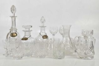 Three cut glass decanters, each with hallmarked silver decanter labels, 'Port', 'Brandy' and '