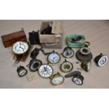 A collection of 20th century brass, onyx and metal clocks and timepieces (qty), with a selection