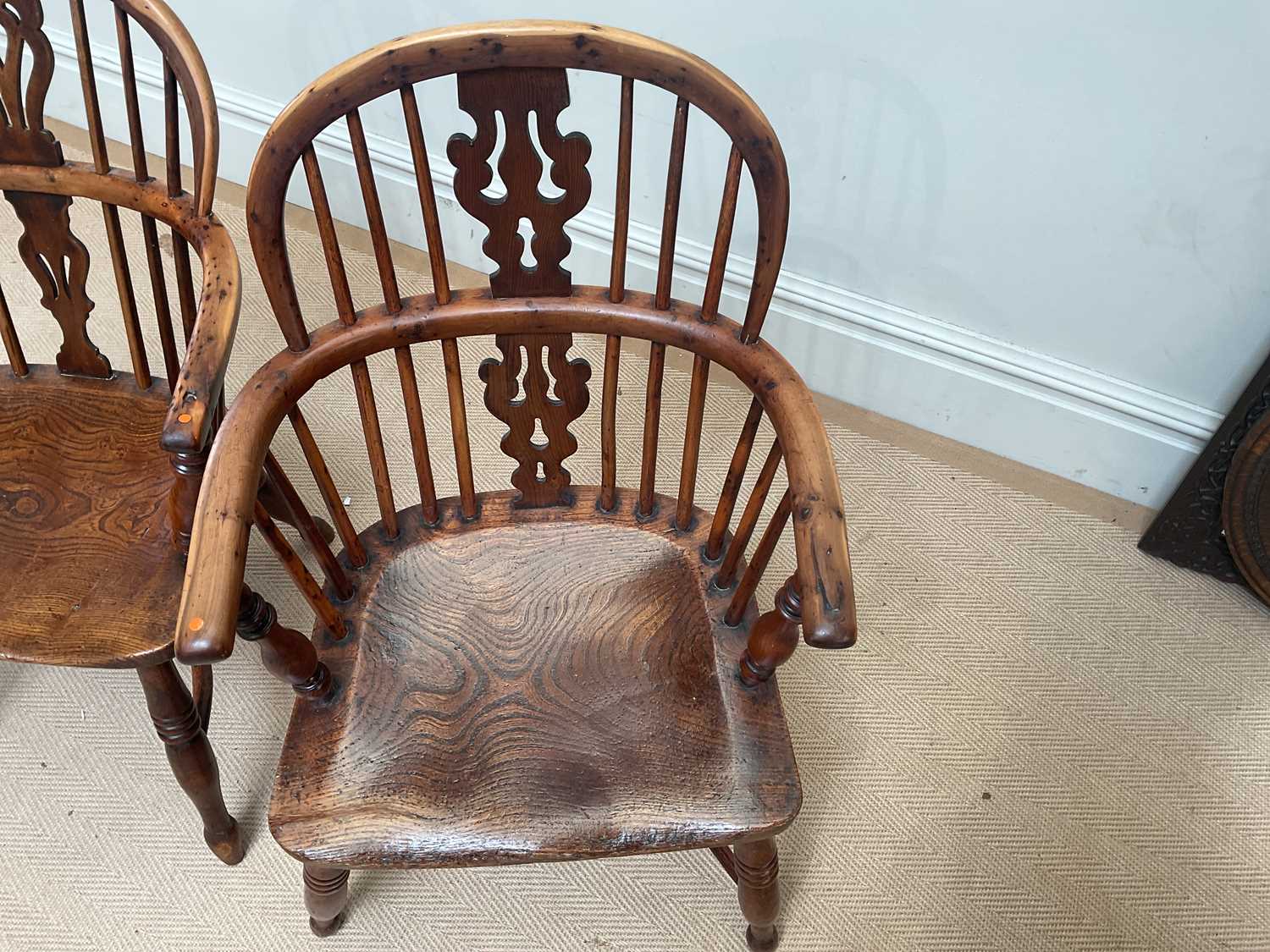 A near pair of 19th century elm and yew wood Windsor elbow chairs, with crinoline stretchers. - Image 3 of 3