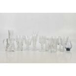 A small collection of cut glass including wine glasses, jugs, Caithness vase, etc.
