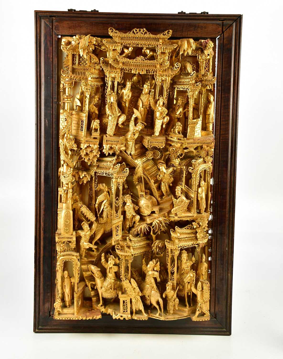 A Chinese gilt wood panel depicting figures in a temple scene within rosewood frame, overall 82 x