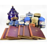 A collection of Victorian and later pharmaceutical items including ceramic jars, books including '