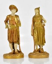 ROYAL WORCESTER; a pair of gilded blush ivory figures, an Arab male and female, numbered 1243,