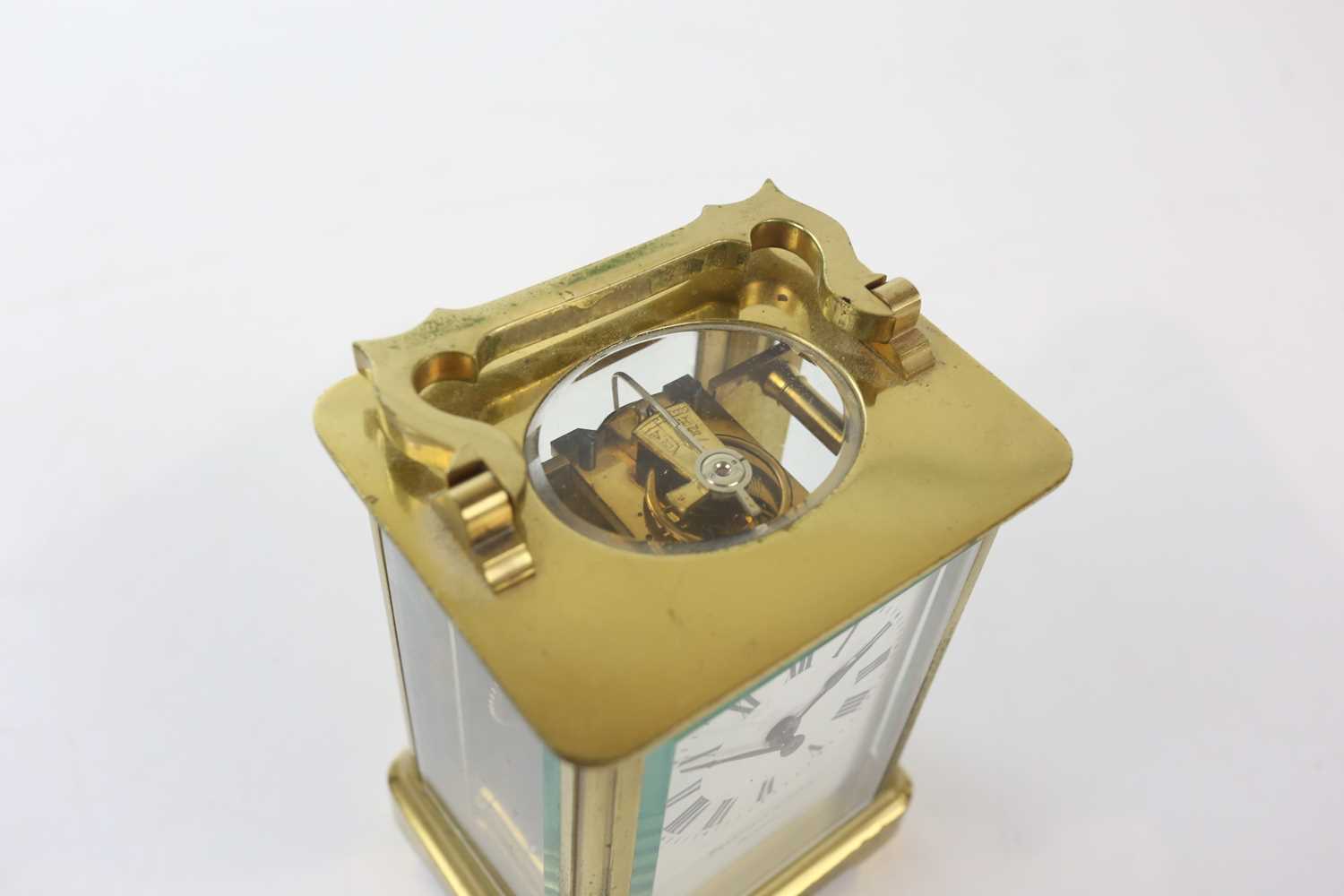 BRAMWELL & SONS; a French brass carriage timepiece, height with handle down 11.5cm, with leather - Image 4 of 5