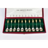 THE QUEEN'S BEASTS; a cased set of ten hallmarked silver spoons, stamped 1972, made to commemorate