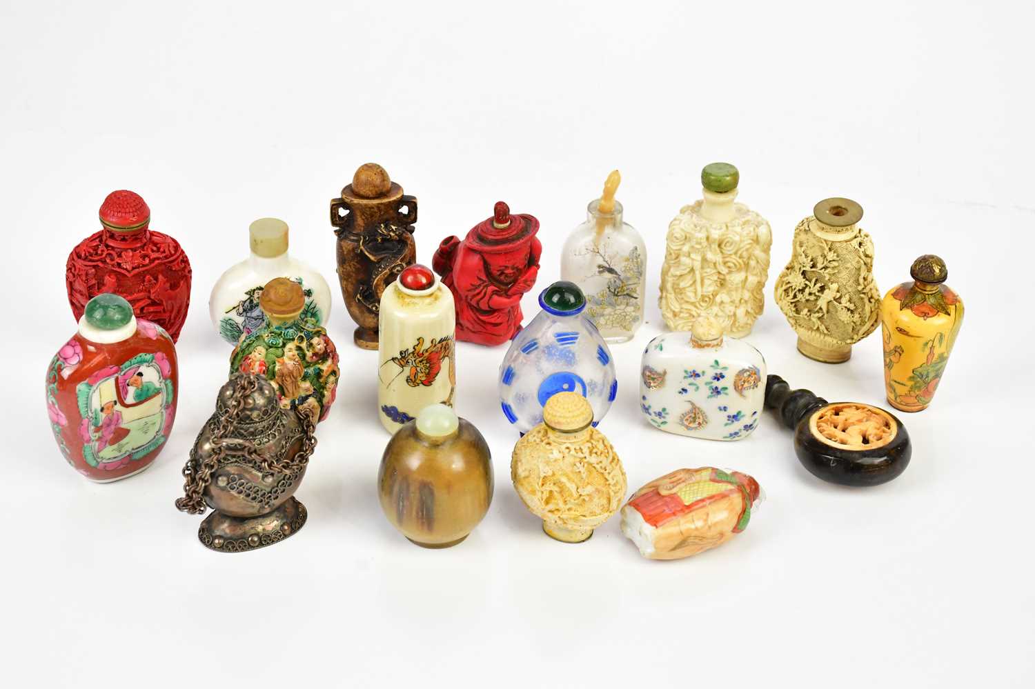 A small collection of modern Oriental snuff bottles.