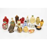 A small collection of modern Oriental snuff bottles.