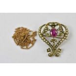 An Edwardian 9ct yellow gold seed pearl, peridot and pink sapphire brooch suspended on a 9ct gold