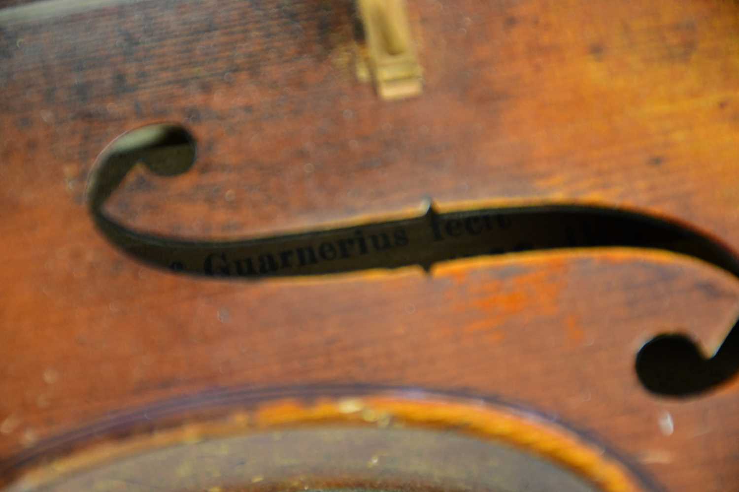 A full size German violin, Guarnerius copy with two-piece back length 35.6cm, cased with a bow. - Image 10 of 18